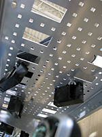 Custom Shelf Bottom Detail Showing Secured Display